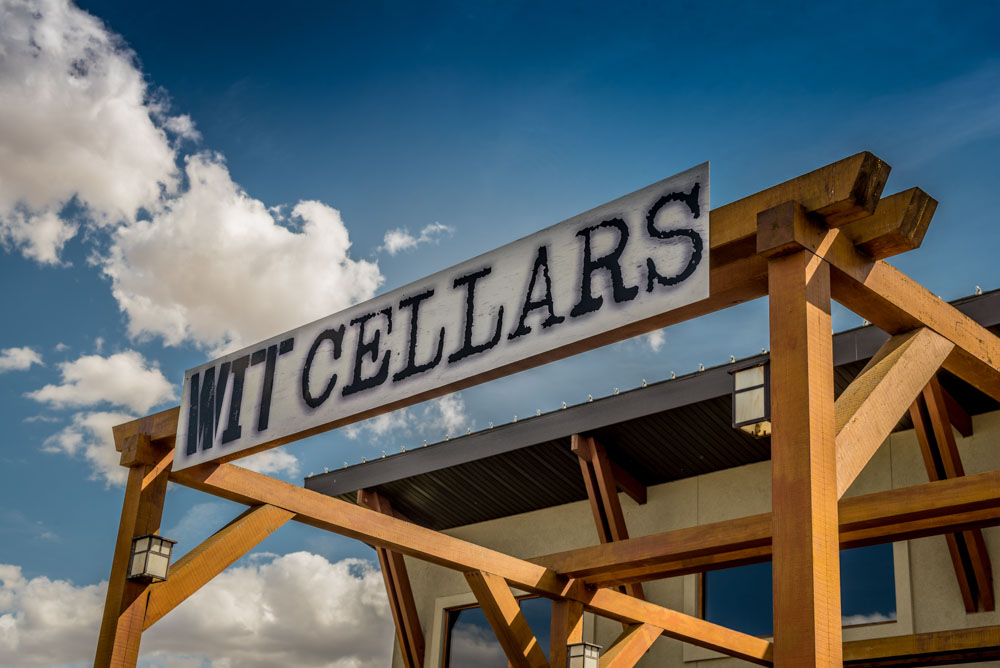 Wit Cellars winery sign against blue sky