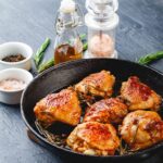 Roasted chicken thighs in cast iron skillet
