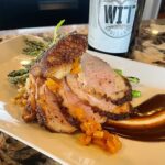 Gourmet duck breast with sauce and wine pairing