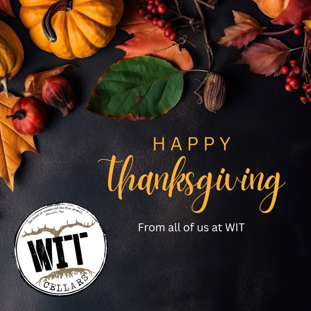 Thanksgiving greeting with autumn leaves and pumpkins.