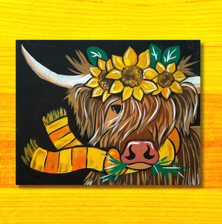 Sunflower crowned cow wearing scarf art piece