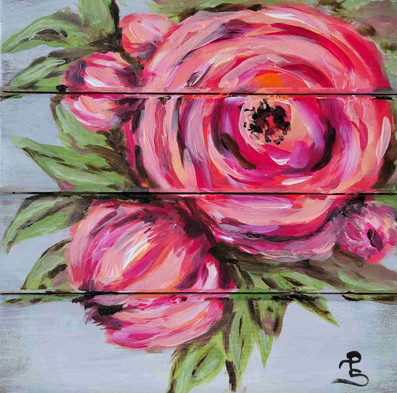 Colorful floral painting on wooden planks