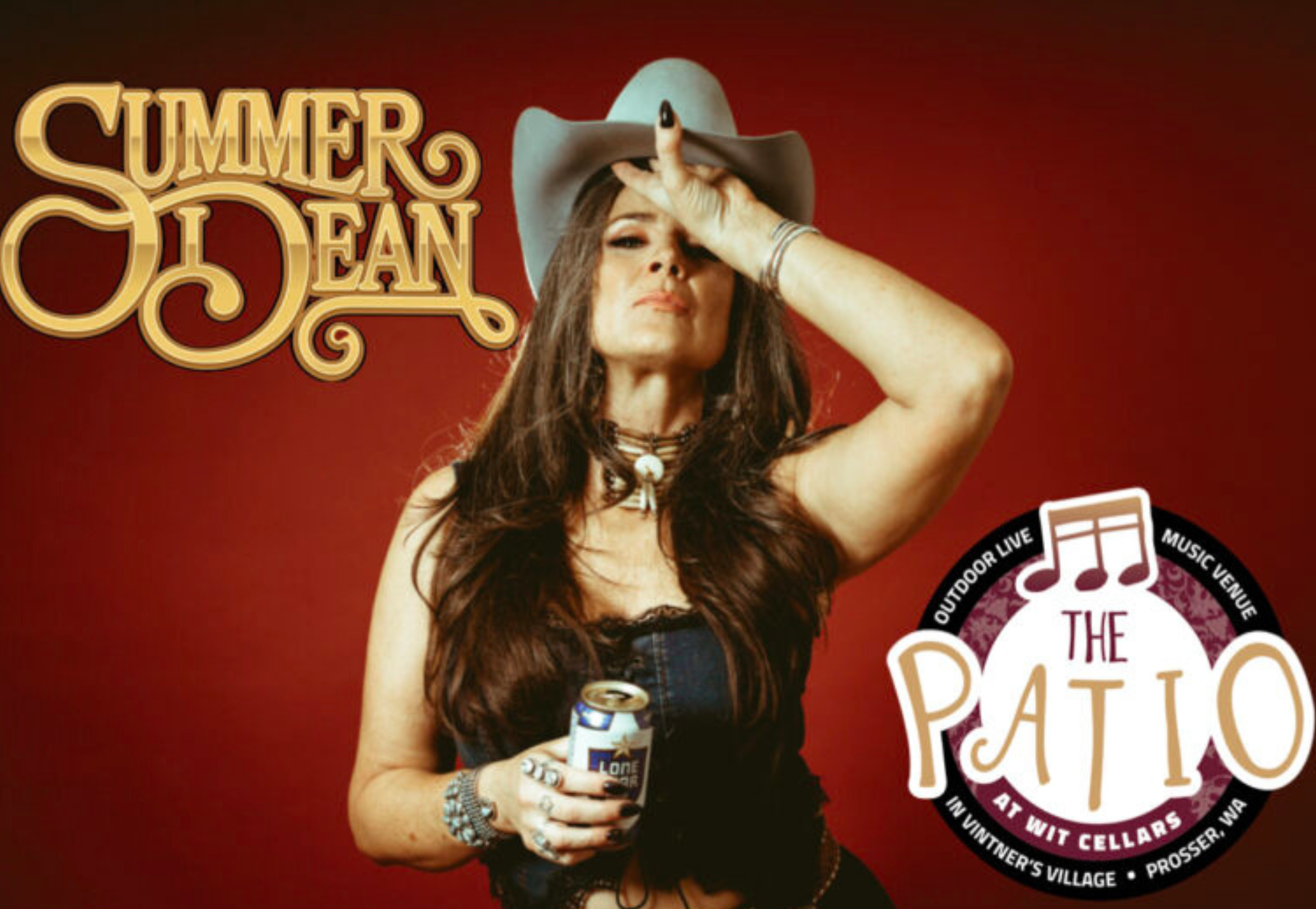 Woman in cowboy hat holding beer can