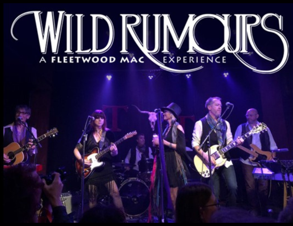 Wild Rumours tribute band performing on stage