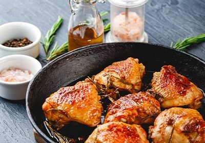 Roasted chicken thighs in cast iron skillet
