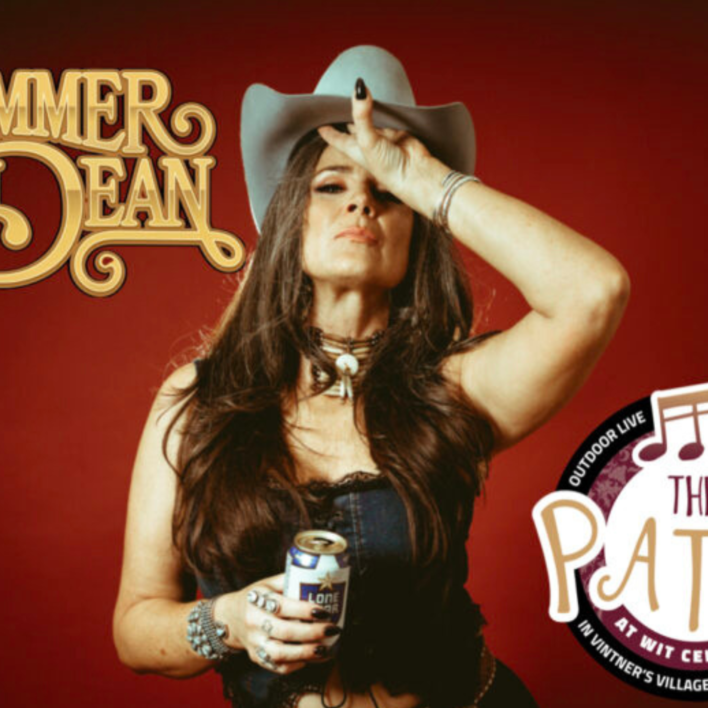 Woman in cowboy hat holding beer can
