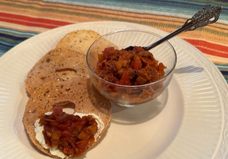 Bagels with cream cheese and tomato topping